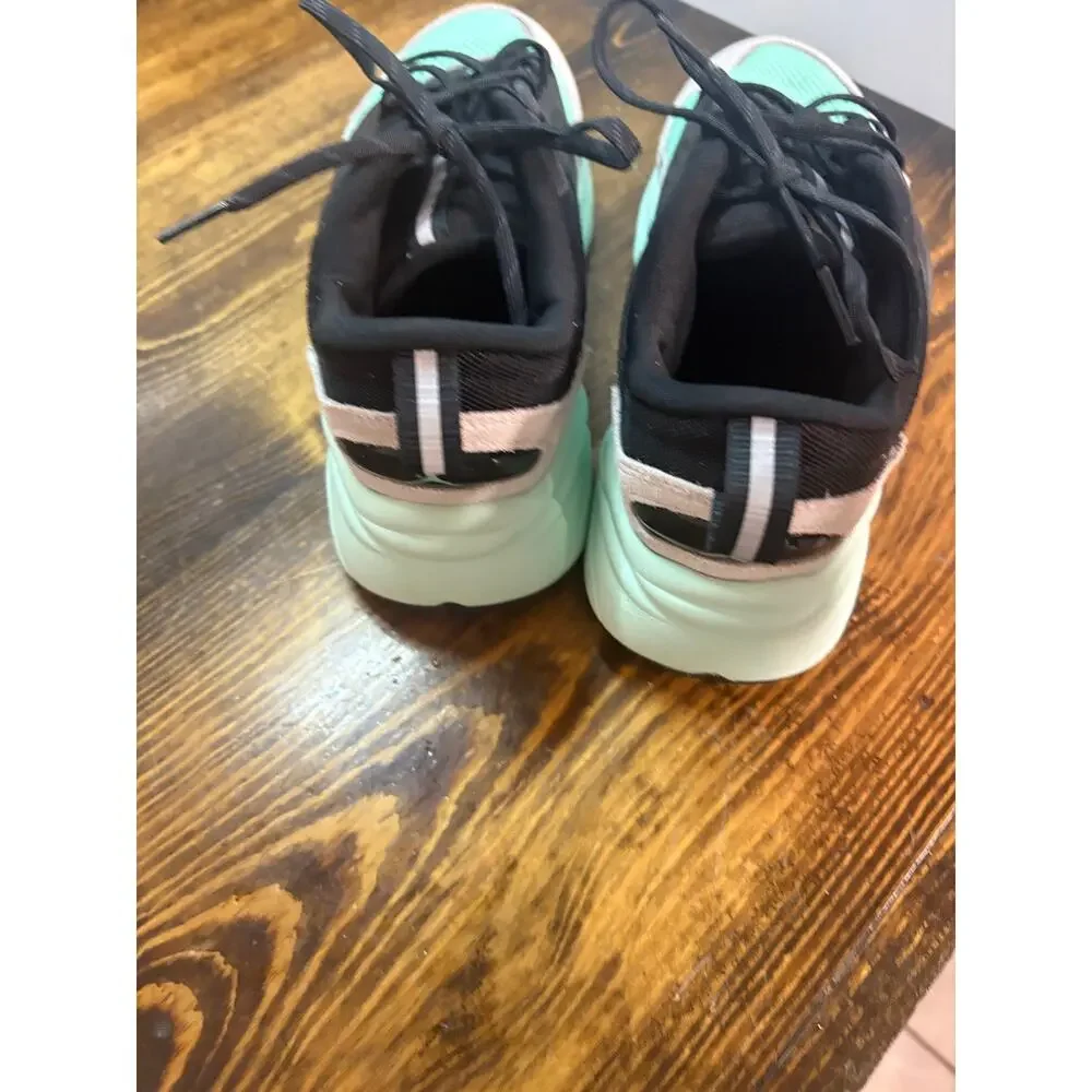 Jordan’s teal and black sneakers size 7Y